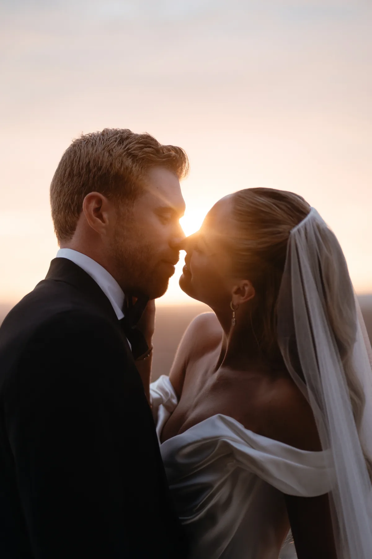 cabo destination wedding planning engaging events by ali thompson hotel - Luxury Cabo Wedding at The Cape, a Thompson Hotel Romantic sunset wedding portrait of bride and groom at The Cape Thompson Hotel in Cabo San Lucas planned by Engaging Events by Ali