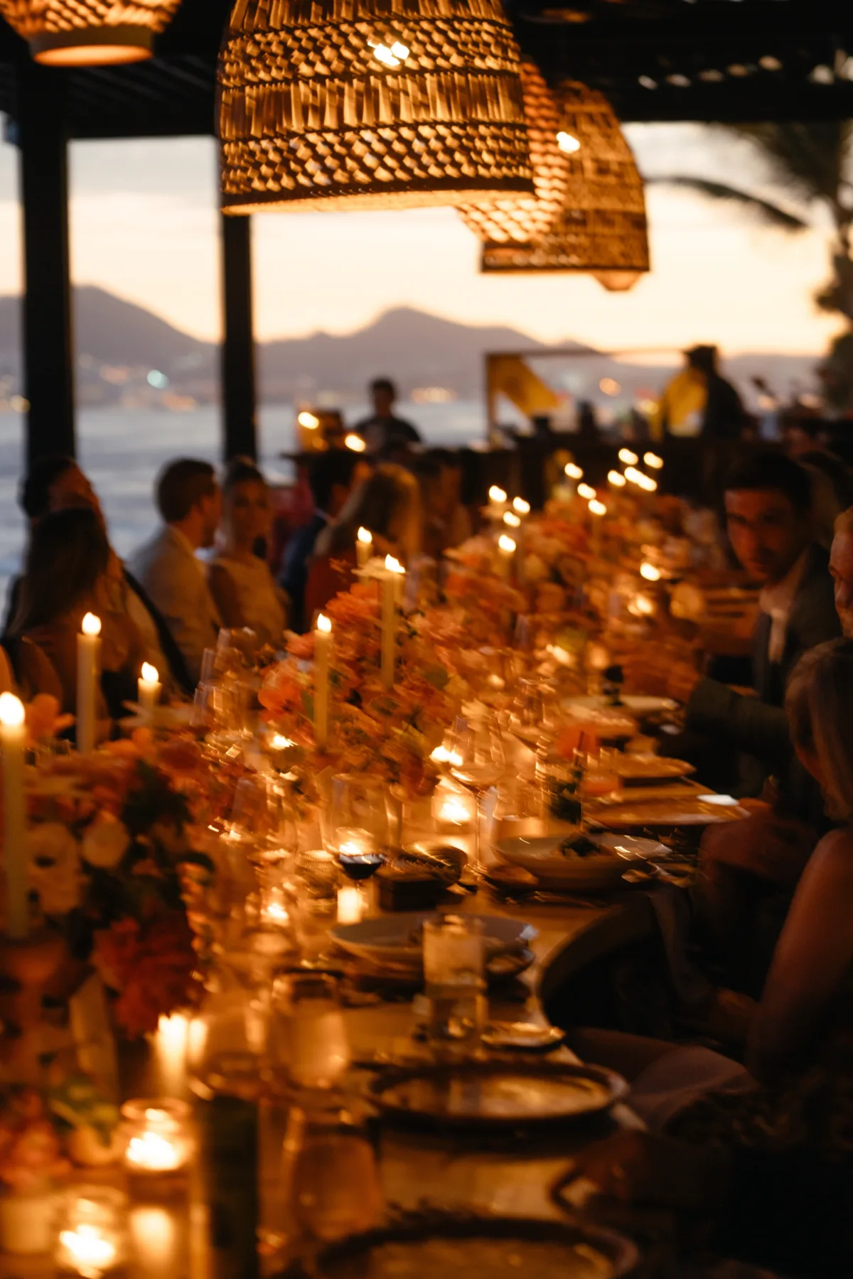 cabo wedding planning engaging events by ali cape thompson hotel reception tablescape - Luxury Cabo Wedding at The Cape, a Thompson Hotel Luxury Cabo wedding reception tablescape with warm candlelight and ocean views at The Cape Thompson Hotel planned by Engaging Events by Ali