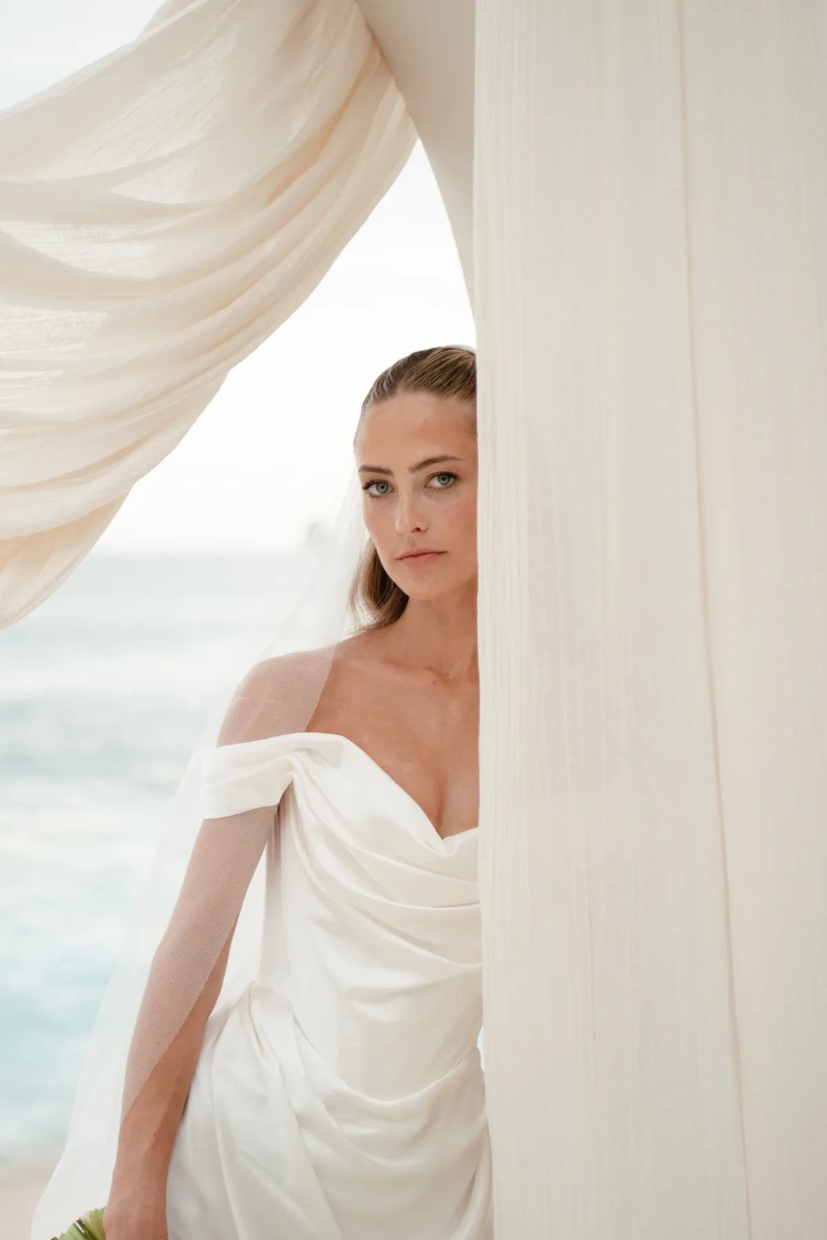 luxury cabo destination wedding planning engaging events ali cape thompson hotel - Luxury Cabo Wedding at The Cape, a Thompson Hotel Luxury destination wedding planning by Engaging Events by Ali at The Cape Thompson Hotel in Cabo San Lucas with elegant white draping and bridal portrait
