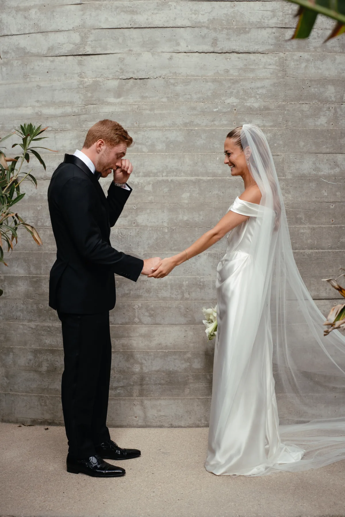 luxury cabo wedding planning engaging events by ali cape thompson hotel - Luxury Cabo Wedding at The Cape, a Thompson Hotel Emotional first look moment at luxury Cabo wedding planned by Engaging Events by Ali at The Cape Thompson Hotel with bride and groom holding hands