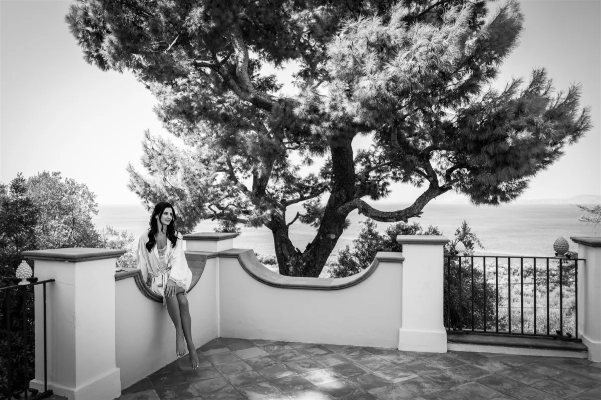 amalfi coast destination wedding planning engaging events by ali capo santa fortunata sorrento - An Effortless Amalfi Coast Celebration Bride in white robe on terrace overlooking Amalfi Coast at Capo Santa Fortunata venue in Sorrento Italy planned by Engaging Events by Ali