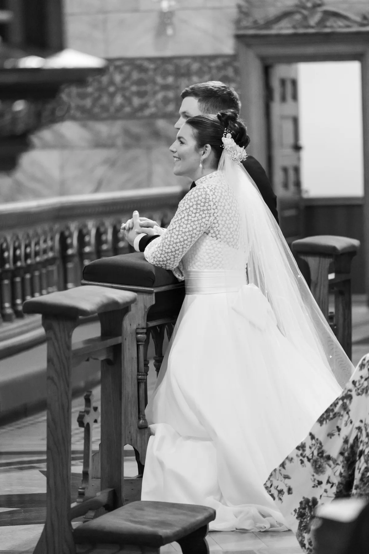 chicago wedding ceremony engaging events planning - A Golden Ritz-Carlton Chicago Celebration Bride and groom holding hands during intimate wedding ceremony planned by Engaging Events by Ali