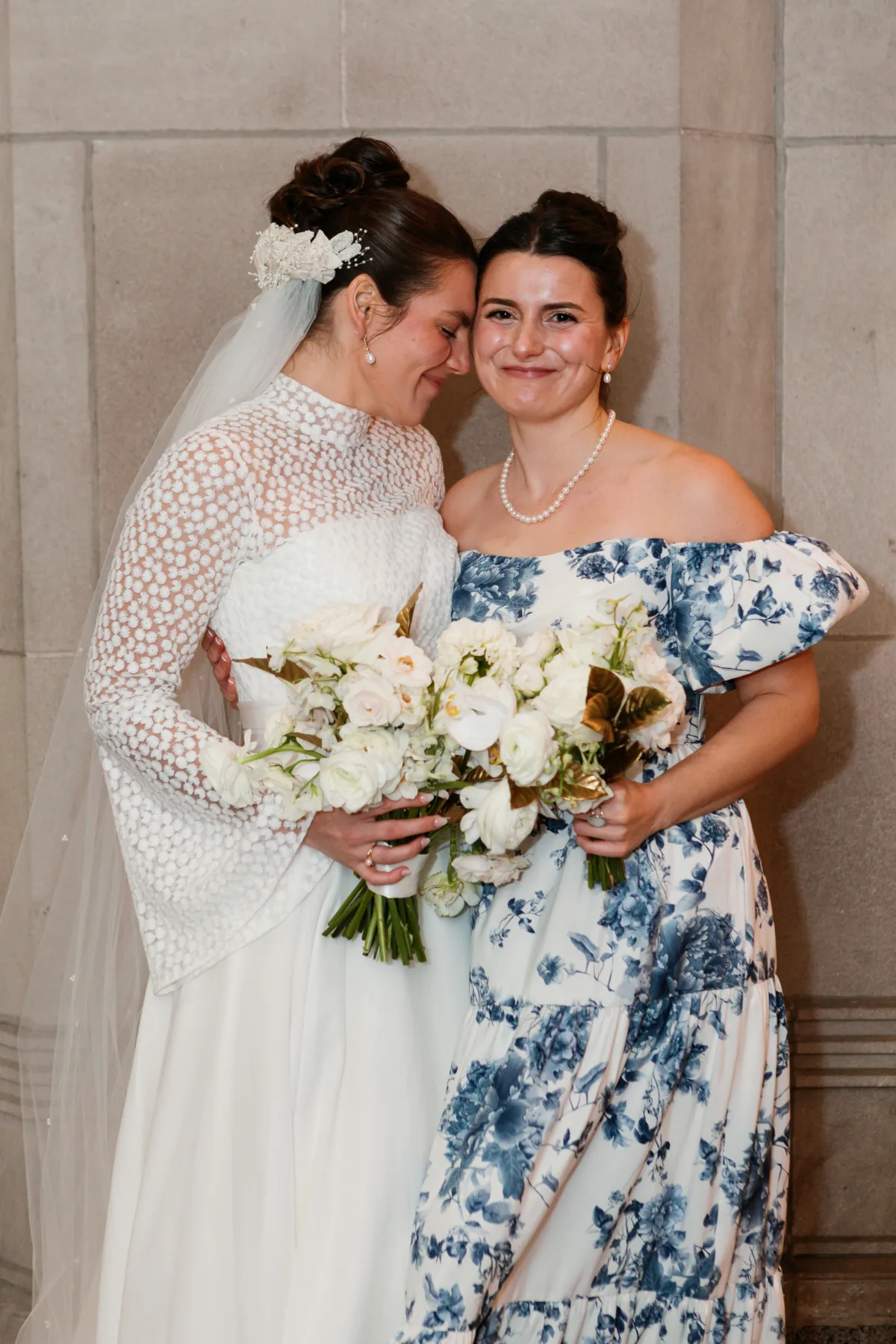 chicago wedding planning engaging events ali ritz carlton bride bouquet - A Golden Ritz-Carlton Chicago Celebration Bride in white lace wedding dress with white flower bouquet at Ritz-Carlton Chicago wedding planned by Engaging Events by Ali