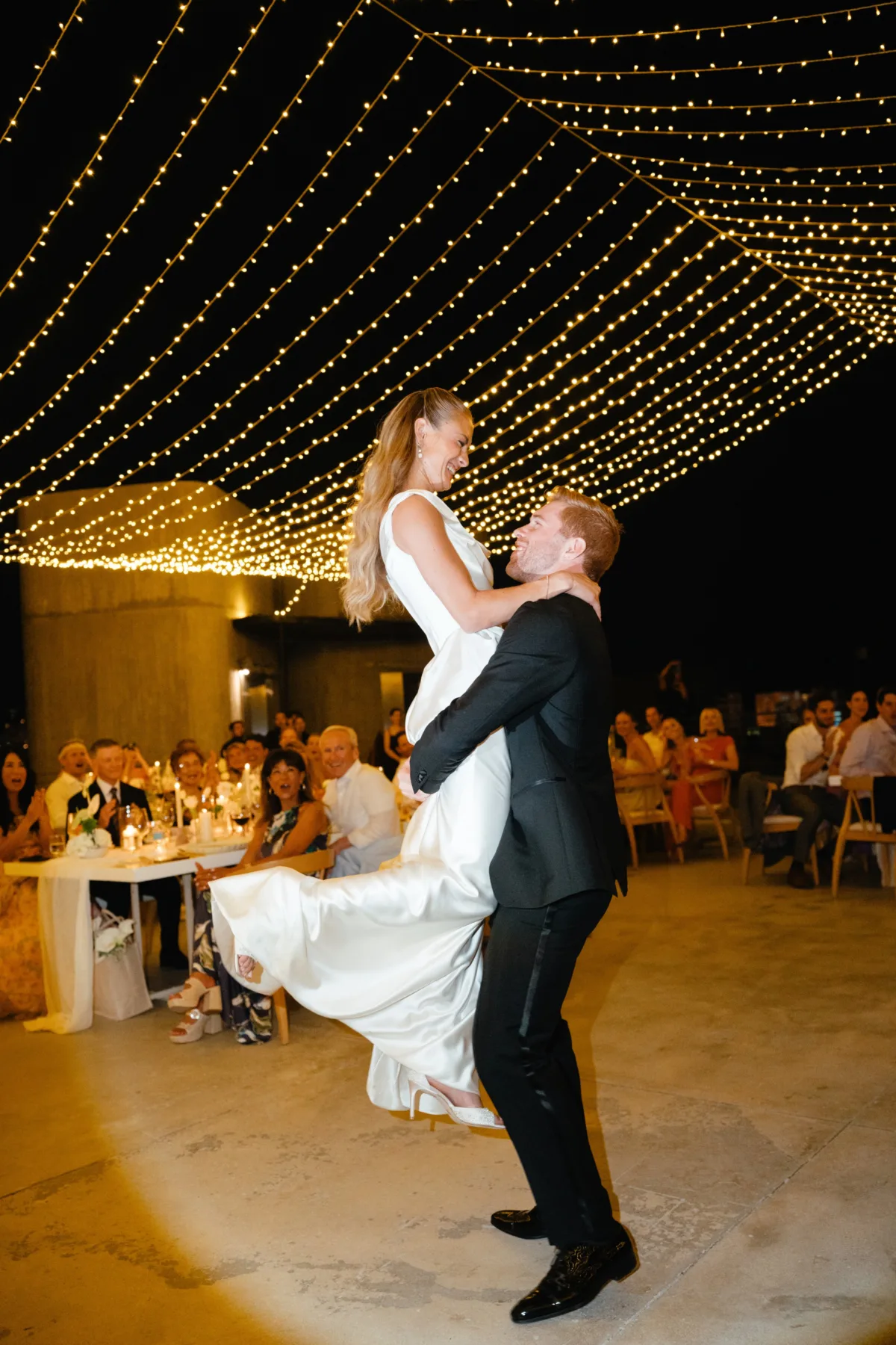 luxury cabo destination wedding first dance the cape thompson hotel - Luxury Cabo Wedding at The Cape, a Thompson Hotel Bride and groom sharing their first dance under string lights at luxury Cabo destination wedding at The Cape, a Thompson Hotel